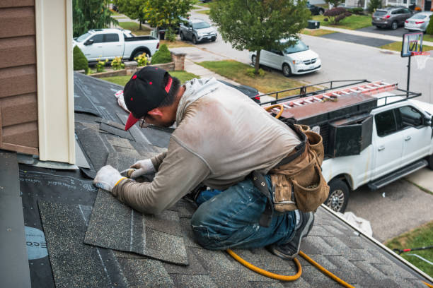 Professional Gutter Repair And Installation technician working in Mangum, OK
